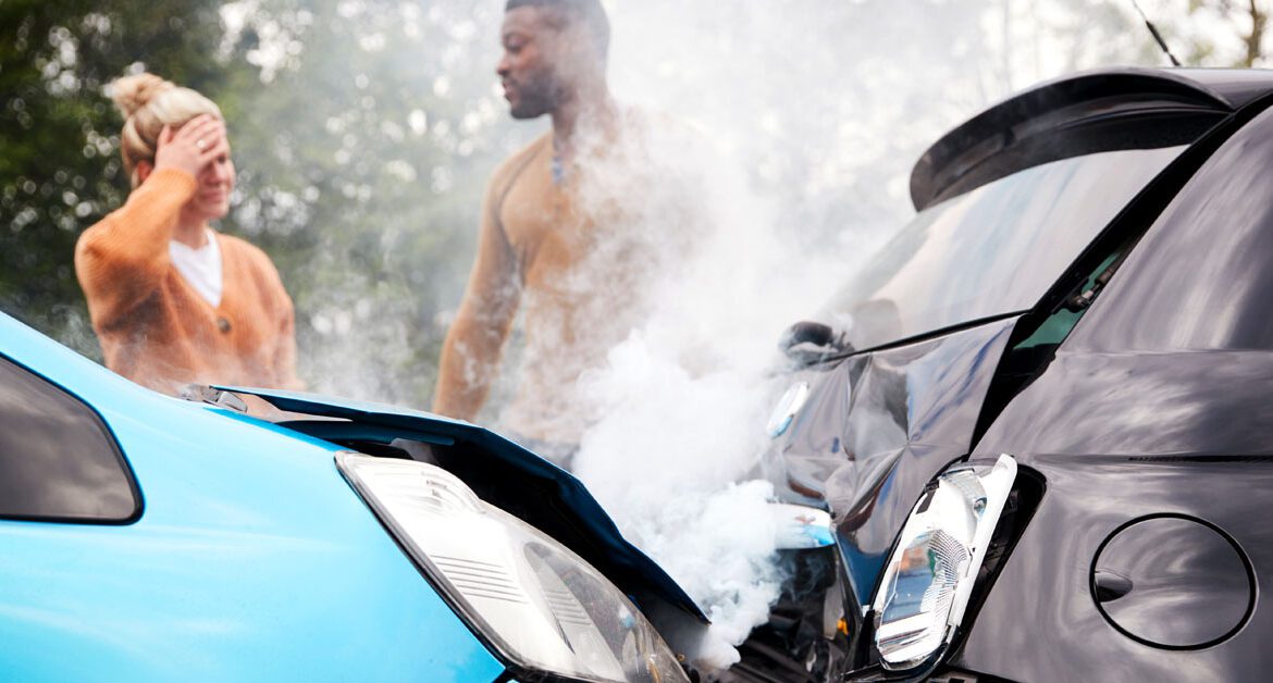 Two Angry Motorists Arguing Over Responsibility For Car Accident