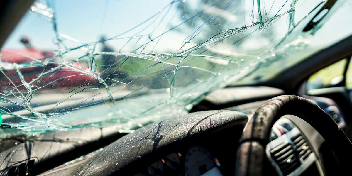 Closeup of crashed car window in car accident