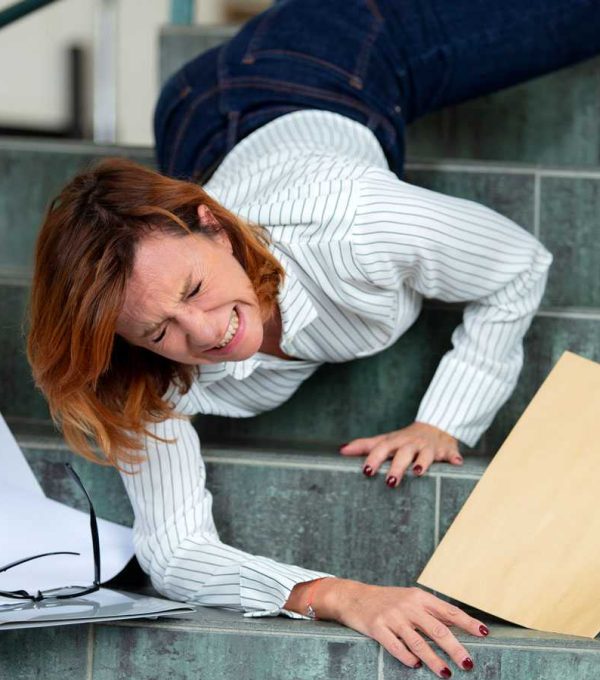 Falling on stairs inside office building